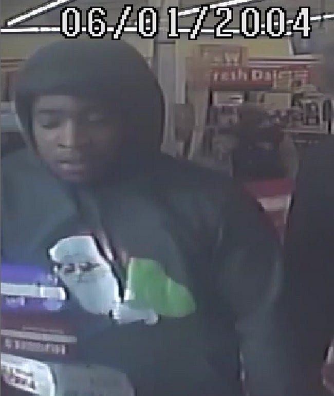 Police are on the hunt for two suspects accused of committing an armed robbery in Detroit on Friday, one of which was wearing a holiday-inspired hoodie during the alleged incident that will hopefully make him easy identify.