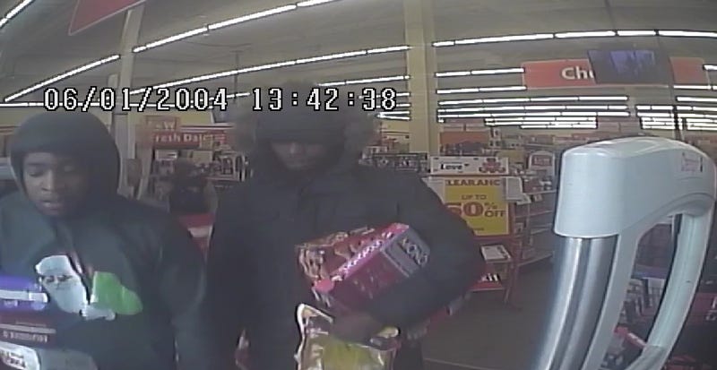 Police are on the hunt for two suspects accused of committing an armed robbery in Detroit on Friday, one of which was wearing a holiday-inspired hoodie during the alleged incident that will hopefully make him easy identify.