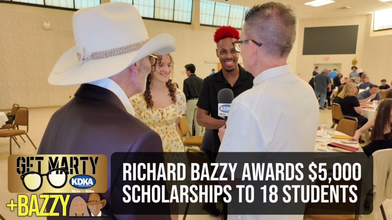 Marty and Bazzy with scholarship students