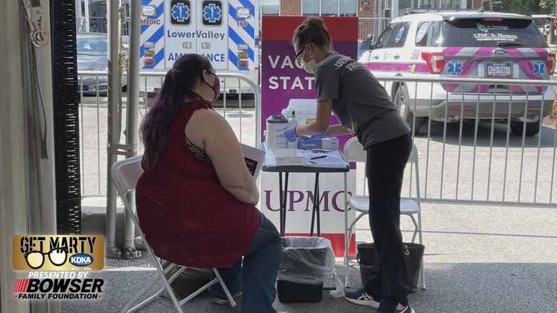 Woman getting COVID-19 vaccination