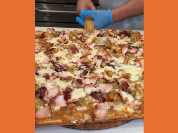 Pino's Pizza of Deer Park, located at 1747 Deer Park Ave., has gone viral for its Thanksgiving pizza pie.