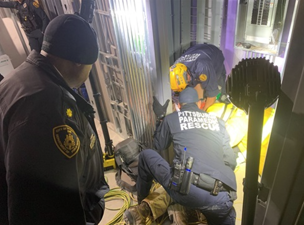Pittsburgh paramedics rescuing a worker 
