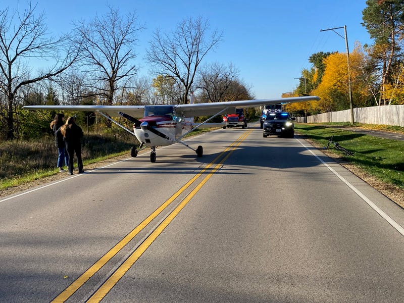 small plane on the road