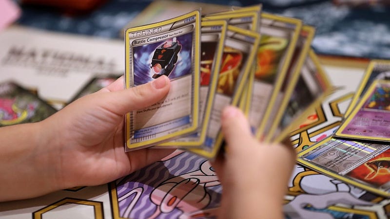 A contestant looks at cards as he competes during the 2016 Pokemon World Championships on August 19, 2016 in San Francisco, California.