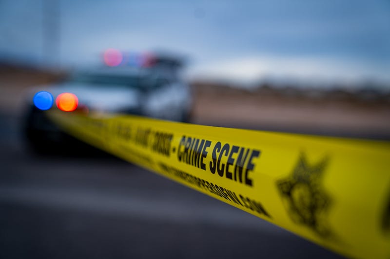 Yellow tape ropes off a crime scene  investigation