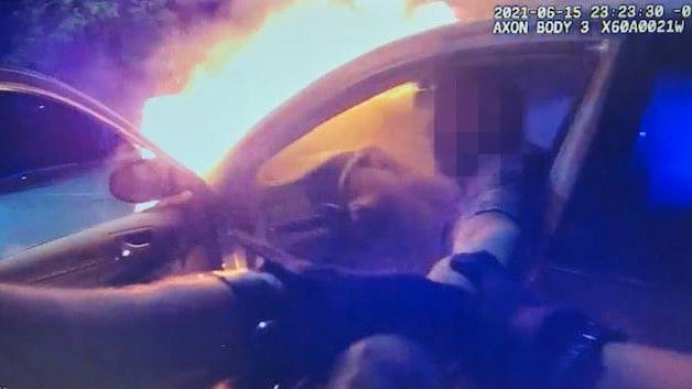 PHOTOS: Heroic Piedmont officer pulls man, dog from burning car