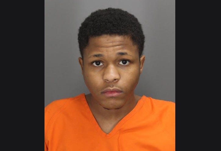The suspected gunman behind a fatal drive-by in Pontiac that killed a young girl as she was returning home from school last week faces life in prison after being charged with 10 felony counts on Friday afternoon.