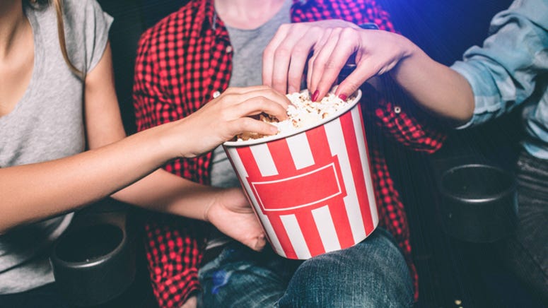 Woman amazes internet with simple hack for buttering popcorn evenly