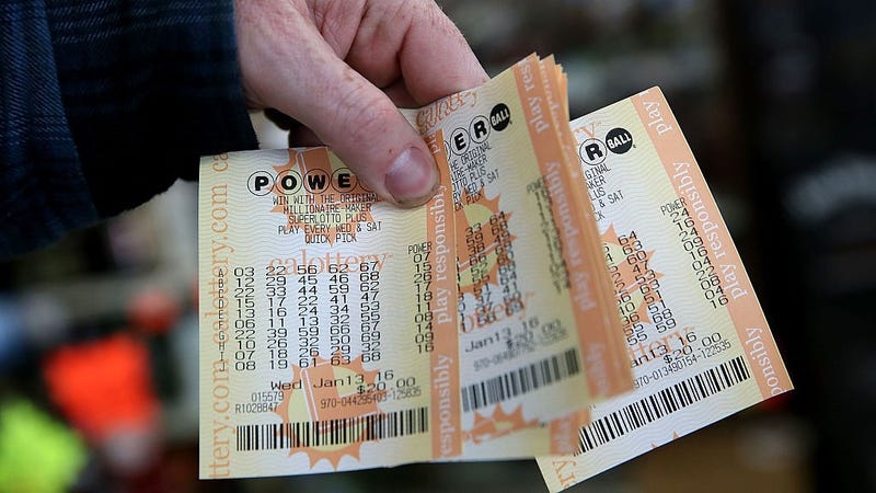 A customer holds a handful of Powerball tickets at Kavanagh Liquors on January 13, 2016 in San Lorenzo, California. 