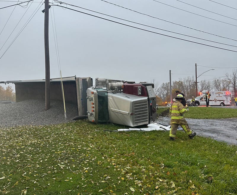 A tractor trailer spilled stone and leaked diesel fuel following the accident