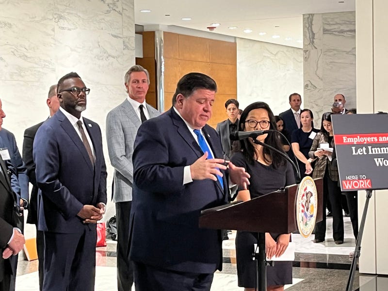 Pritzker at lectern