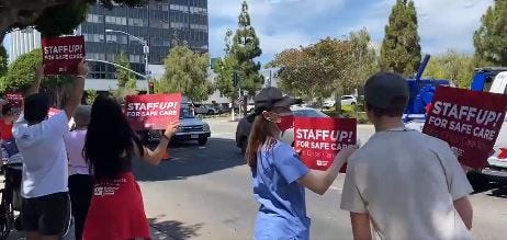 Registered nurses protesting outside Providence Saint John's Health Center in Santa Monica in regard to chronic staffing shortages in the hospital.
