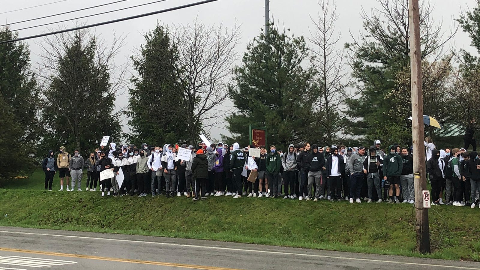 Players, students, parents protest firing of football coach at Pine-Richland
