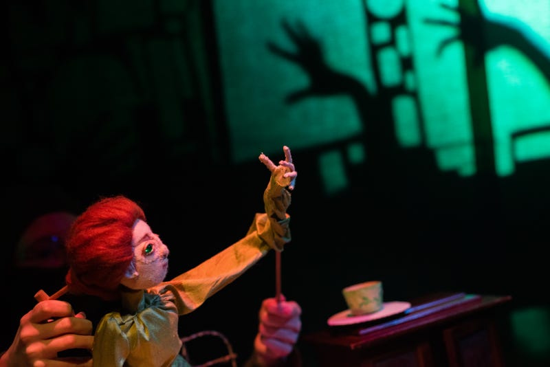 Scene from puppet show "Difficulty of proof in some cases of arsenic poisoning"