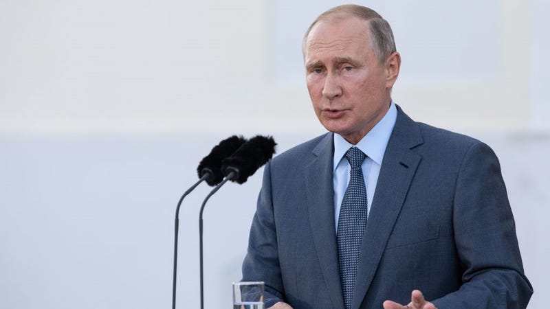 Russian President Vladimir Putin speaks during a joint press statement with German Chancellor Angela Merkel (not pictured) prior to their meeting at Schloss Meseberg palace, the German government retreat, at Meseberg on August 18, 2018 in Gransee, Germany.