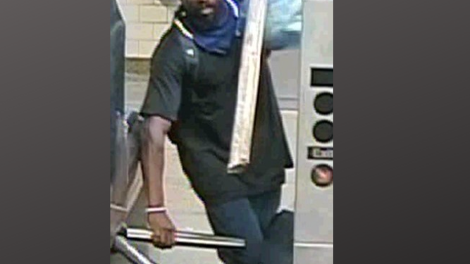 Man uses pole, glass bottle to damage Queens subway station