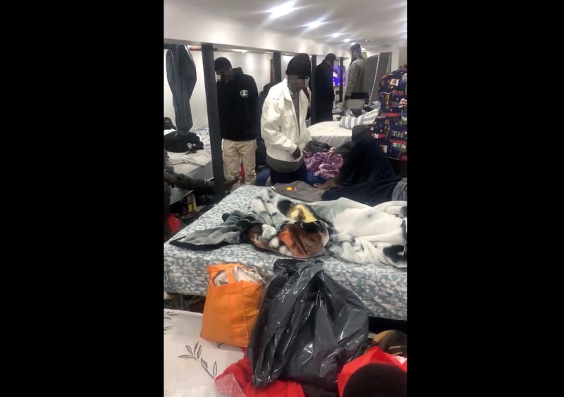 Dozens of people were found living at a commercial establishment on Liberty Avenue in South Richmond Hill, sources said