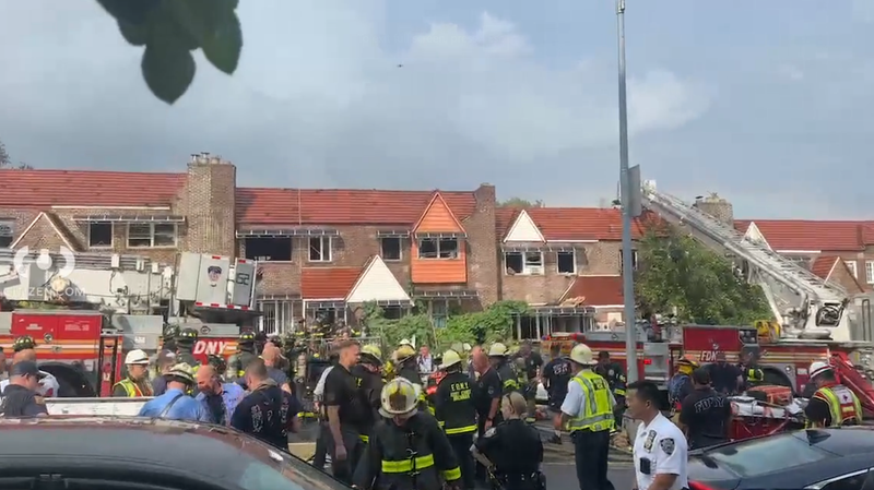 Citizen App footage shows first responders at the site of a 5-alarm fire in Queens Village on Saturday,