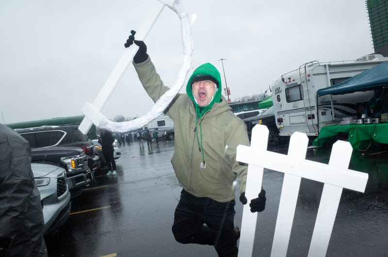 Eagles fan holds up "D-fence" sign
