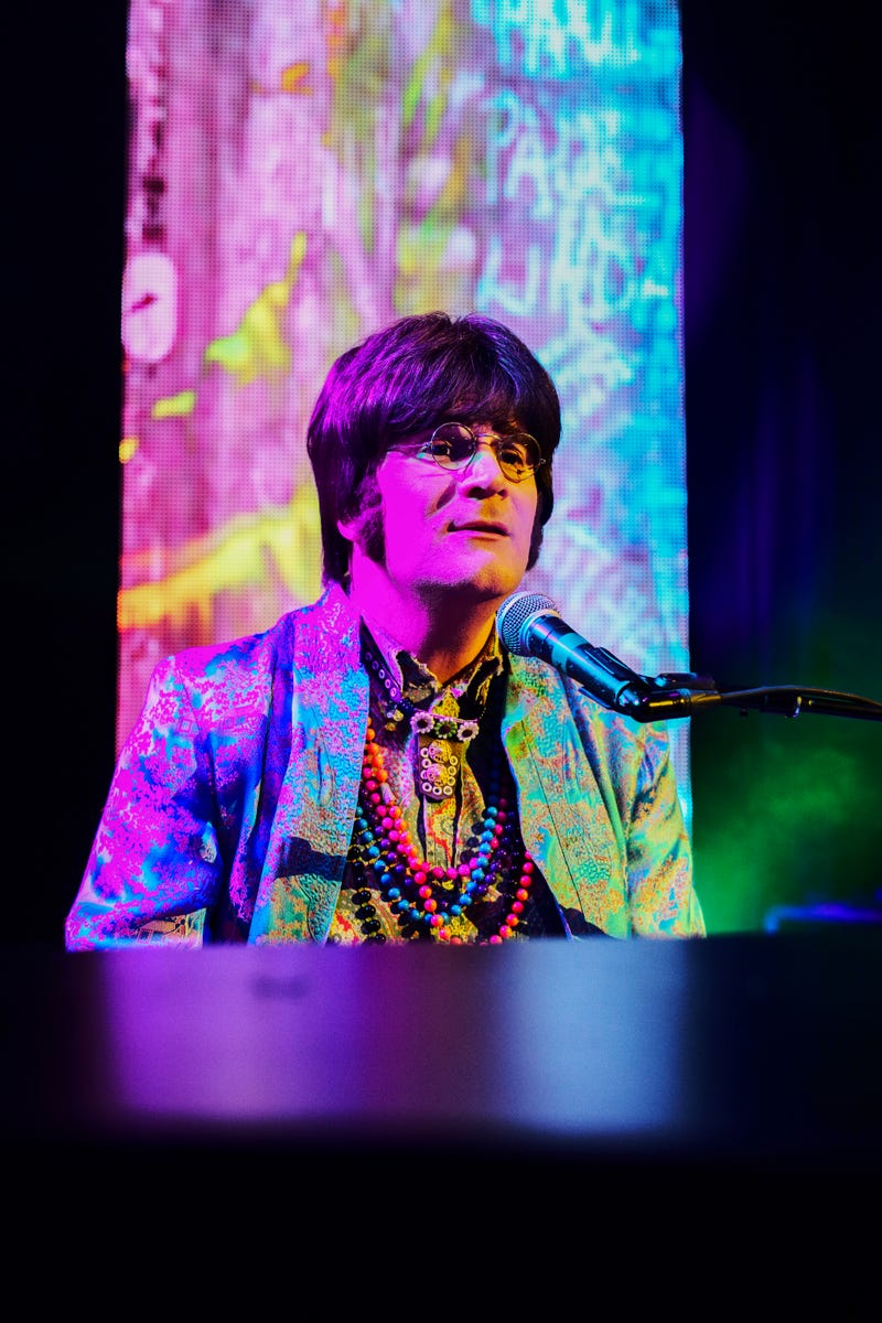 Steve Landes performs as John Lennon in RAIN - A Tribute to the Beatles