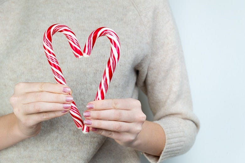 candy canes held in shape of a heart