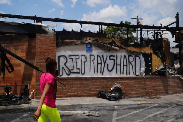 A Wendy's restaurant where 27-year-old Rayshard Brooks was killed was set on fire June 13, 2020 and hundreds of people marched to protest the killing.