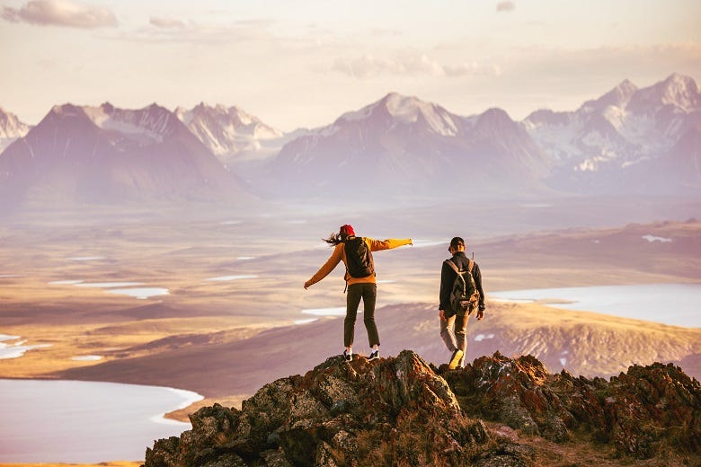couple on top of mountain