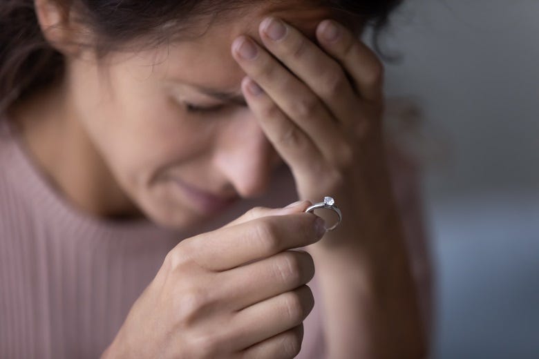 woman and engagement ring