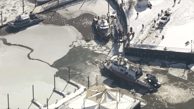 Boats search an icy Delaware River for the Camden firefighter, who fell in the river and went under the ice around 11 a.m.