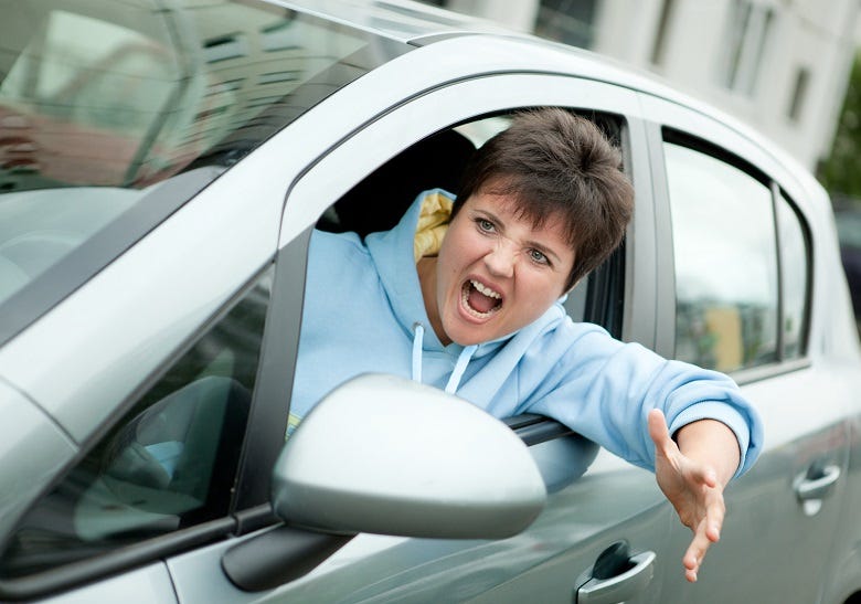 female driver yelling