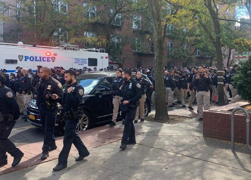 More than 200 police officers were seen along Roosevelt Avenue, including members of the New York State Police