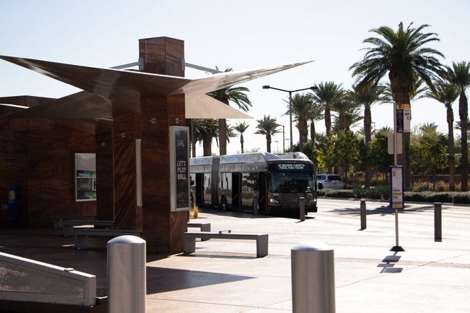 A Regional Transportation Commission bus picks up passengers