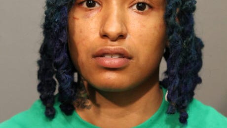 Woman charged with looting Loop business