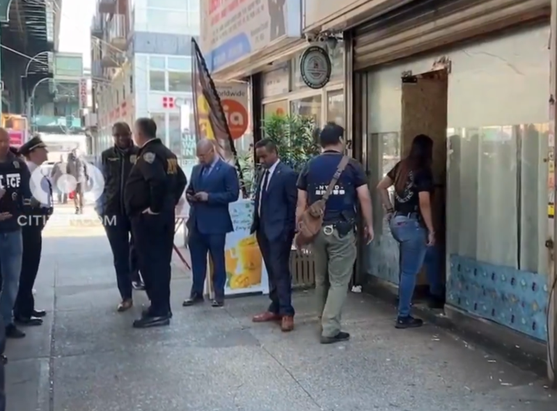 Police raid a brothel on Roosevelt Avenue on Oct. 30, 2024