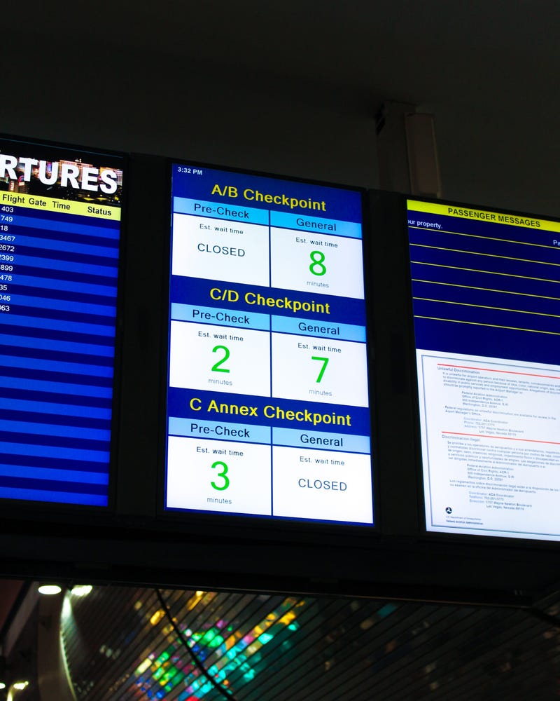 Screens display wait times through security at Harry Reid International Airport