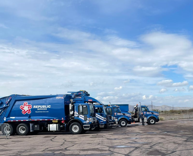 A fleet of Republic Services sanitation trucks.