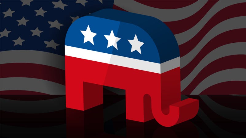 An elephant in silhouette with an American flag in the background republican political mascot