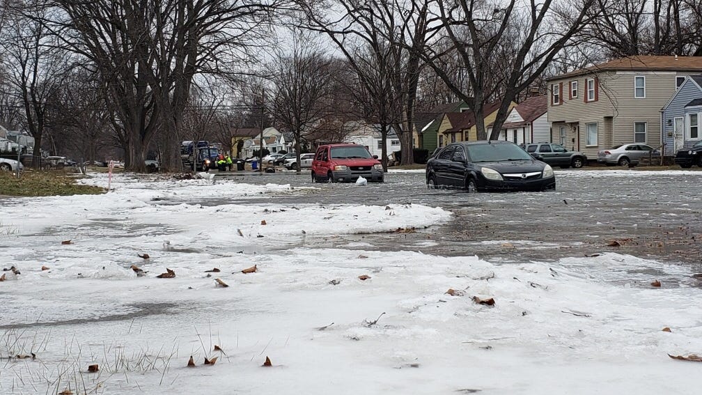 Residents, cars stuck in ice at water main break site in northwest Detroit