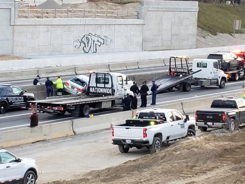 Car slams into median wall on I-94 during police chase, leading to officer involved shooting