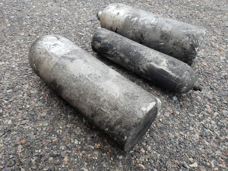 Cannisters sent flying in explosions in Clinton Twp. Monday.