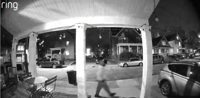 Man on doorbell camera at night