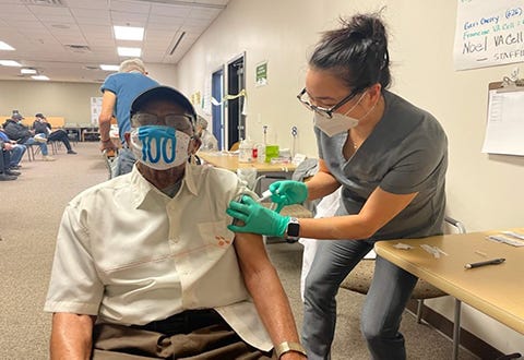 Robert Hays, a 100-year-old U.S. Army veteran, receives his final dose of the COVID-19 vaccination at VA Greater Los Angeles Healthcare System’s (VAGLAHS) West Los Angeles campus on Jan. 29, 2021. Since mid-December of 2020, VAGLAHS has administered more than 25,000 novel coronavirus vaccines to veterans and staff.