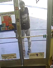 Surveillance video of a rock throwing suspect from 4-15-22