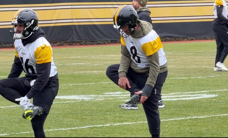 Aaron Rodgers stretching