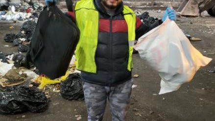 Sanitation Dept. lets Bronx man dig through mountain of trash to retrieve laptop