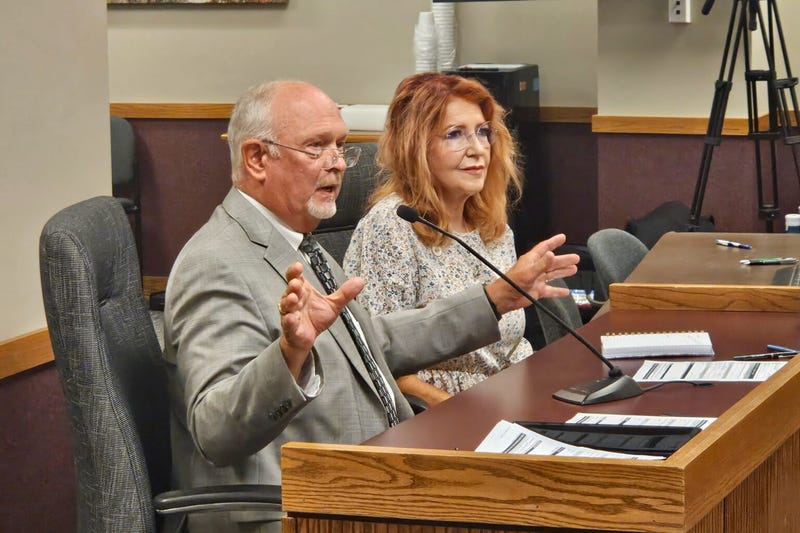 Gary Romine, chairman of the State Tax Commission, testifies to a Missouri House committee Wednesday with commission member Debbi McGinnis.
