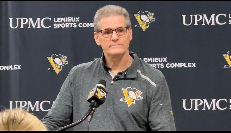 Ron Hextall at a podium