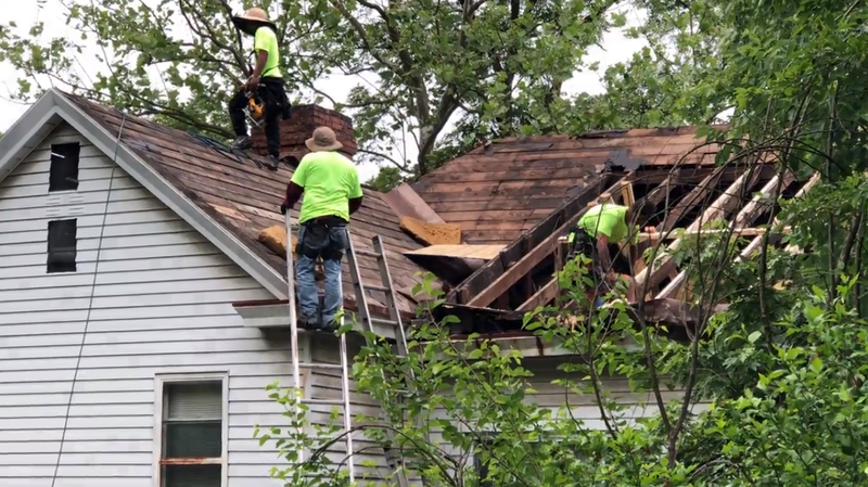 It took workers about two days to tear off the old roof, repair the substructure, and install a nice new roof.