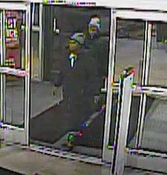 Surveillance photo of two men wanted in connection with a robbery at Dick's Sporting Goods in Roseville.