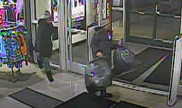 Surveillance photo of two men wanted in connection with a robbery at the Dick's Sporting Goods in Roseville